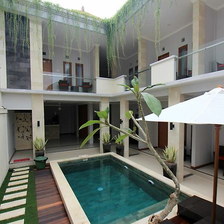 Tom Guest House Легиан Экстерьер фото