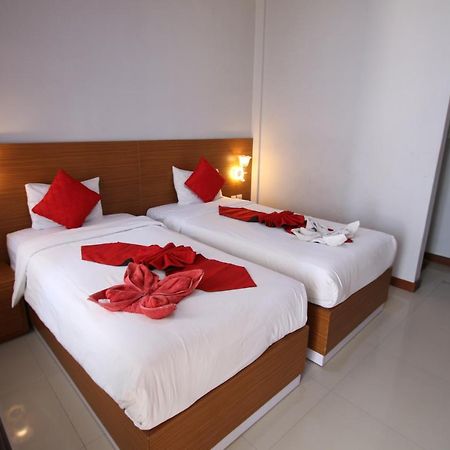 Tom Guest House Легиан Экстерьер фото