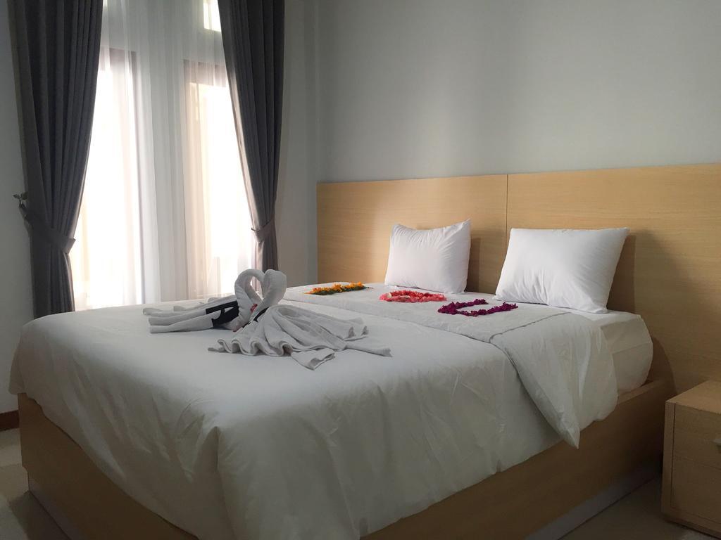 Tom Guest House Легиан Экстерьер фото