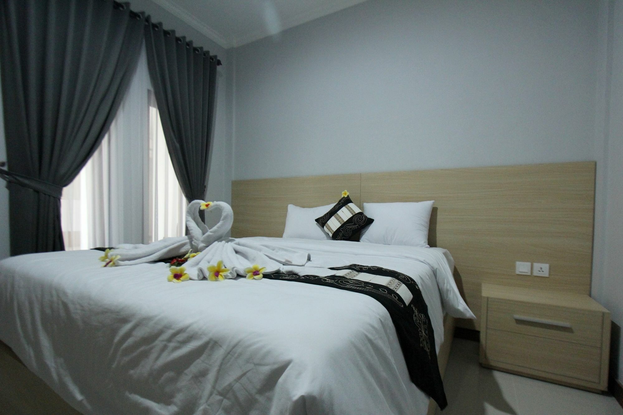 Tom Guest House Легиан Экстерьер фото