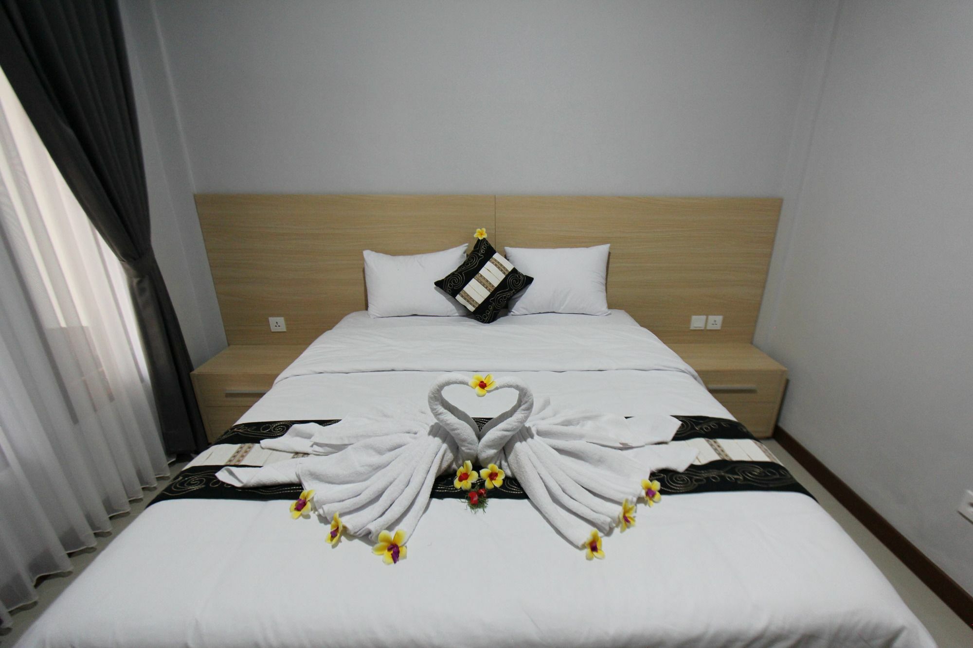 Tom Guest House Легиан Экстерьер фото