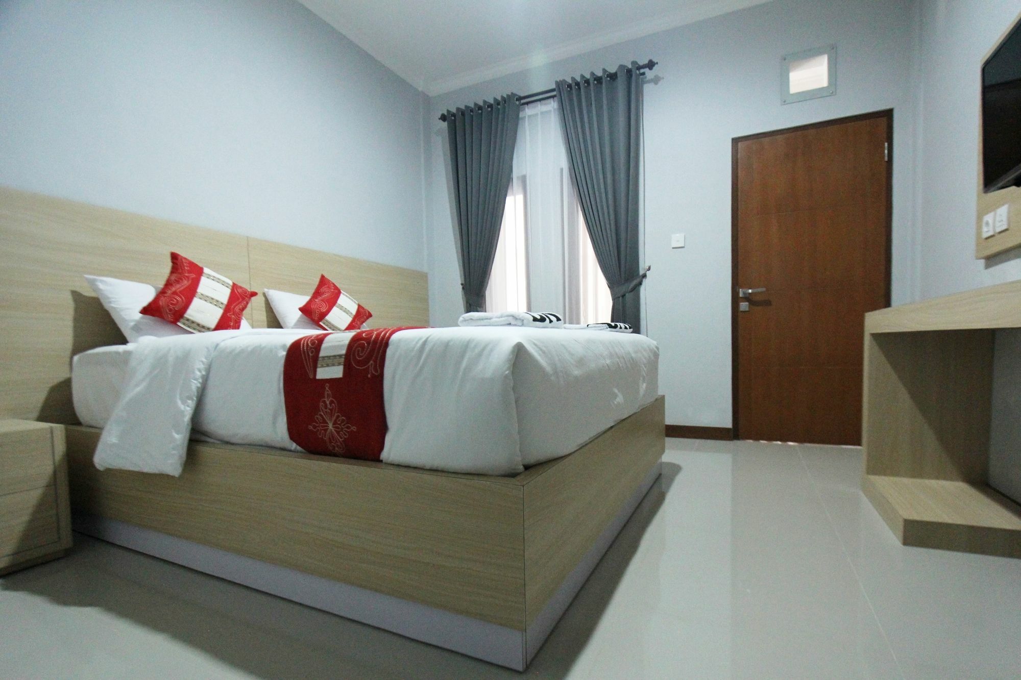 Tom Guest House Легиан Экстерьер фото