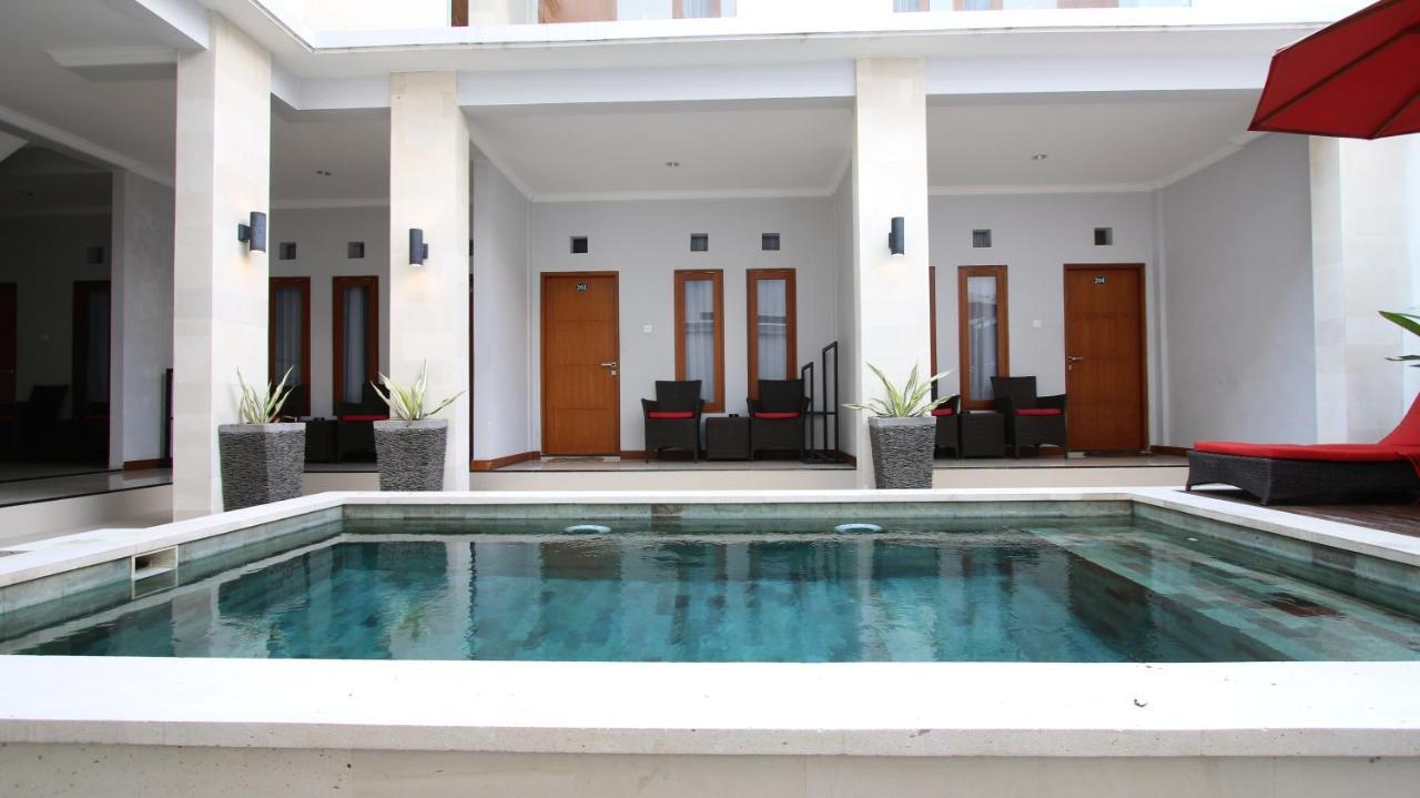 Tom Guest House Легиан Экстерьер фото