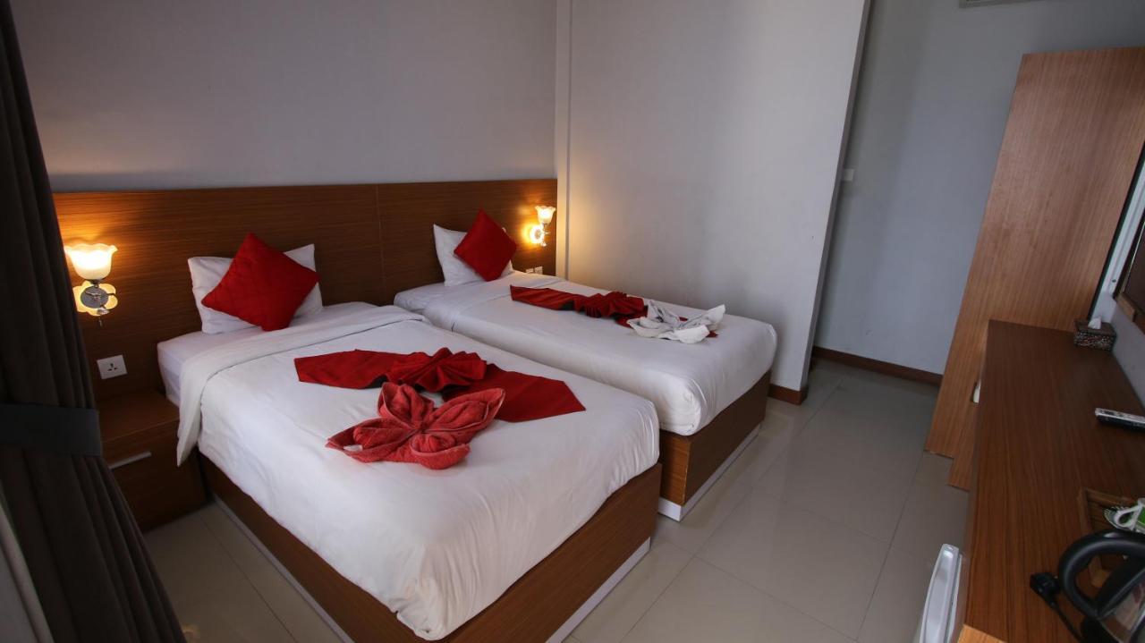 Tom Guest House Легиан Экстерьер фото