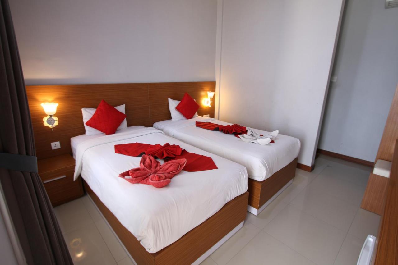 Tom Guest House Легиан Экстерьер фото